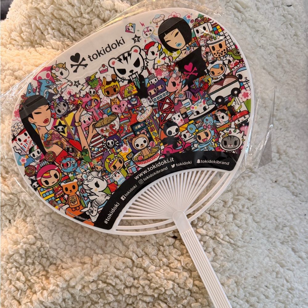 Tokidoki Multicolor Character Fan. Plastic frame /handle. In original cellophane